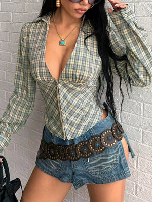 sage green blouse with plaid and deep v-neck