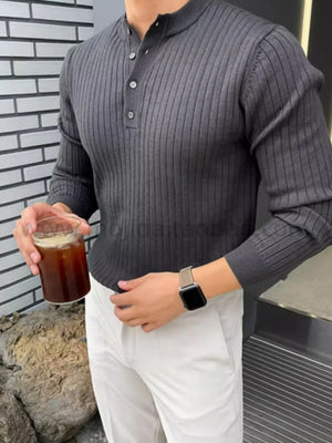 Dark gray ribbed knit Henley sweater with button accents and long sleeves.
