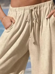 wide-leg pants in mustard yellow with tied and cropped