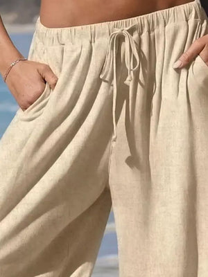 wide-leg pants in mustard yellow with tied and cropped
