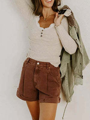 Beige ribbed long-sleeve top with lace trim and button detail