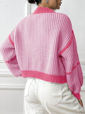 hot pink cardigan featuring ribbed and color-block