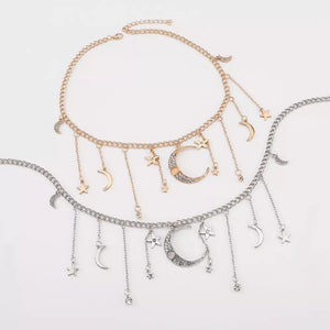 gold necklace with star charms and sleeveless