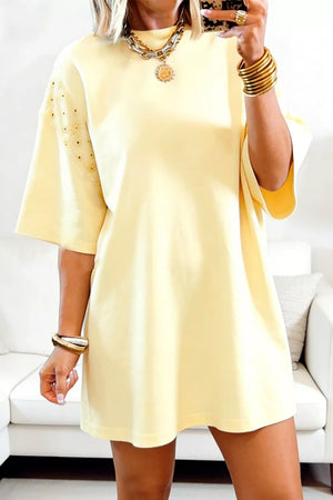 Yellow t-shirt dress with embroidered detail on sleeves and crew neck.