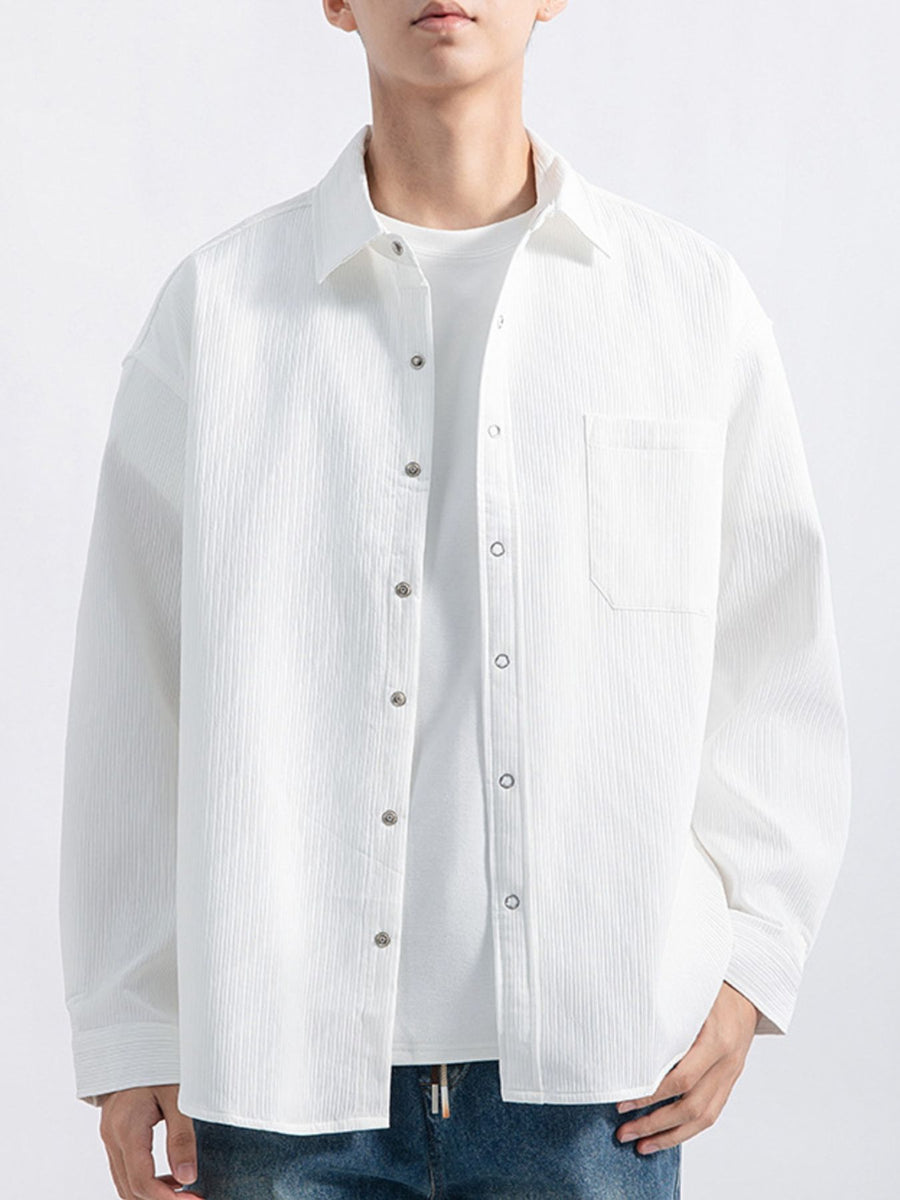 black button-down shirt with button-front and textured