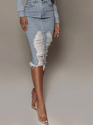 Light wash denim pencil skirt with distressed rips and frayed hem
