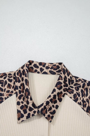 Ribbed cream shirt with leopard print collar and lapels.