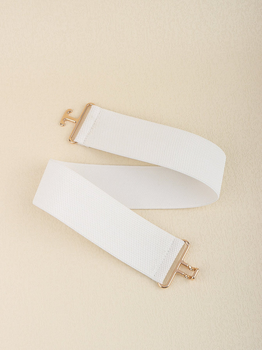 White elastic belt with sculpted gold buckle and textured band