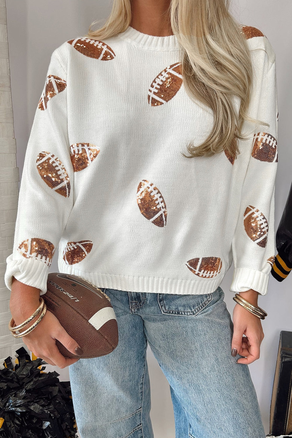 ivory pullover sweater with novelty print and round neck
