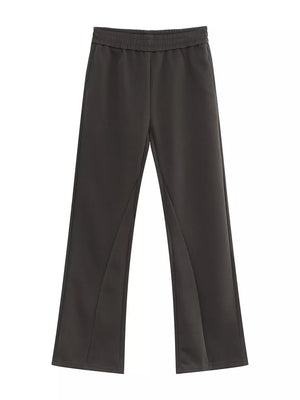 Relaxed fit dark gray sweatpants with adjustable waist and seam detail.