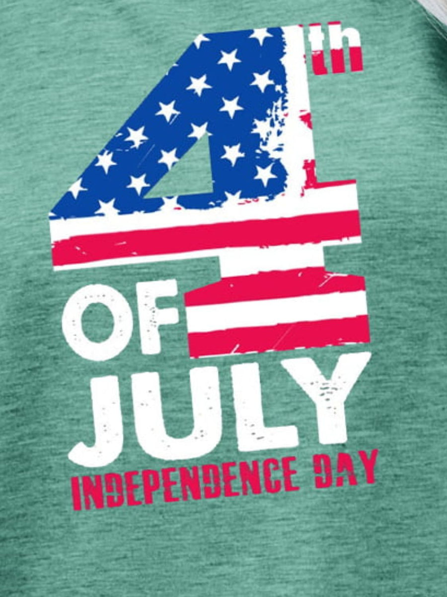 Independence Day graphic tee in Gum Leaf green with 4th of July text and American flag design.