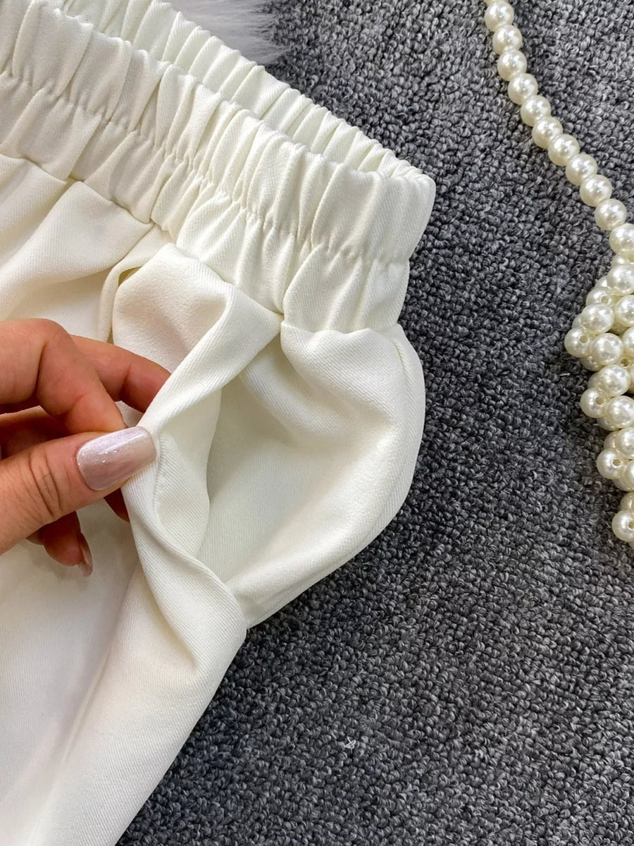 White belted two-piece set with pockets and elastic waistband detail