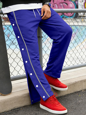 pants in Blue with side snap buttons and full-length