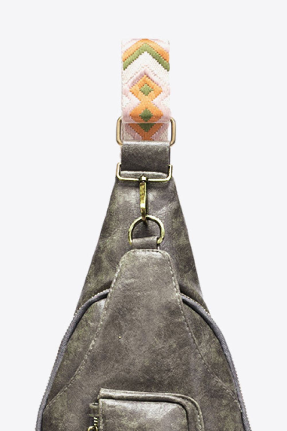 Gray textured sling bag with woven strap detail and gold hardware