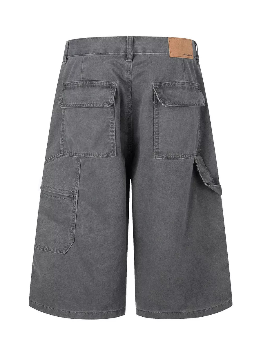 Men's relaxed fit grey cotton cargo capris with multiple pockets and a button closure.
