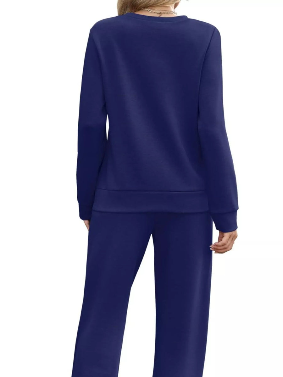 Casual long-sleeve top and pants set in dark blue, featuring a crew neck and relaxed fit pants.