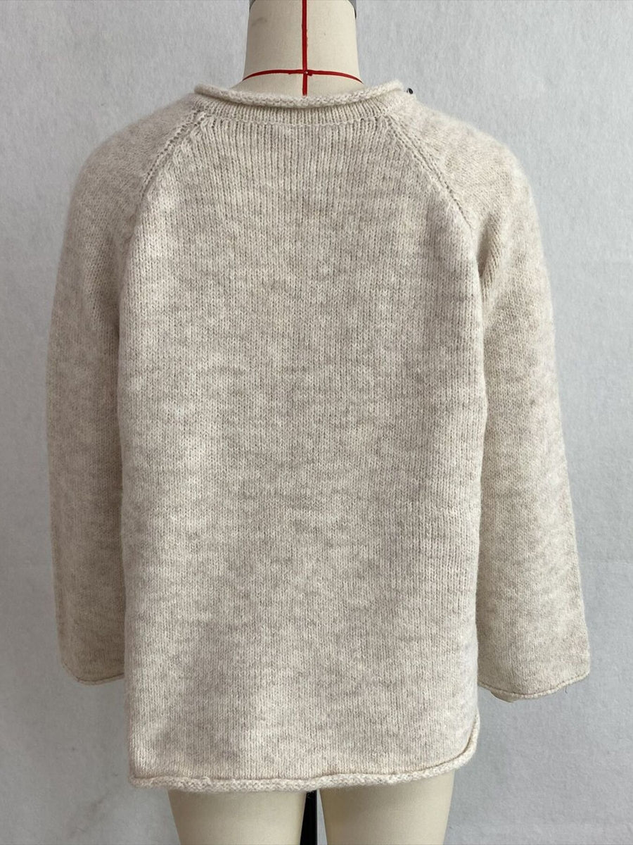 v-neck sweater in ivory with polka dot and tied detail
