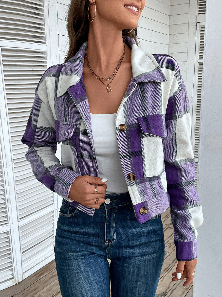 Checked plaid shacket in deep purple with patch pockets and button closure.