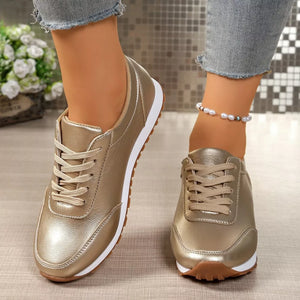 sneakers in metallic gold featuring round toe and regular fit