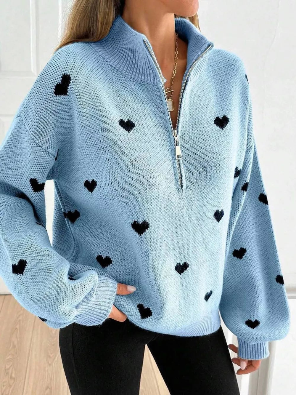 pullover sweater featuring heart-print in Gray with 100% polyester Care instructions: Machine wash cold texture