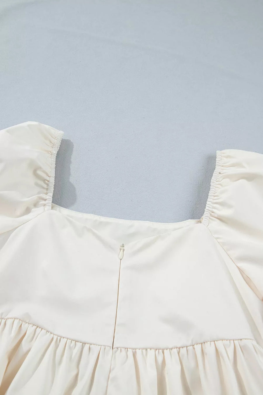 Cream puff sleeve square neck dress with gathered skirt and zipper detail