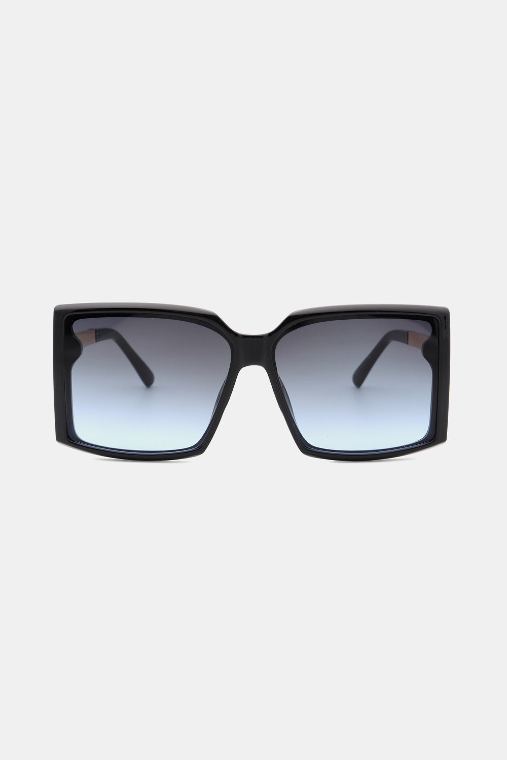 Black geometric sunglasses with gradient blue lenses and bold frames.