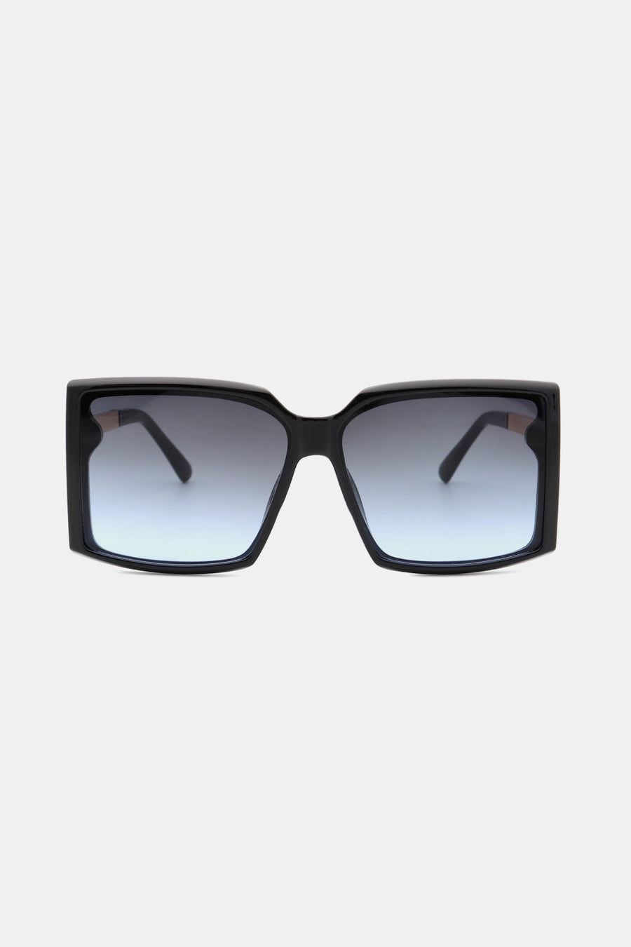 Black geometric sunglasses with gradient blue lenses and bold frames.