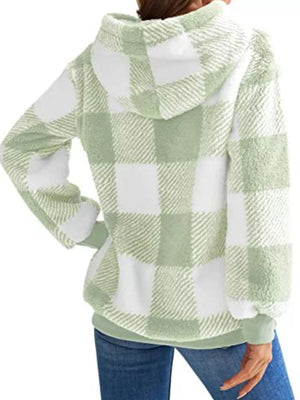 Green and white plaid sherpa drawstring hoodie with fuzzy texture.