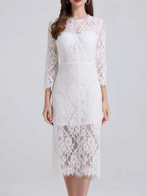 White lace midi dress with sheer sleeves and a sweetheart neckline detail.