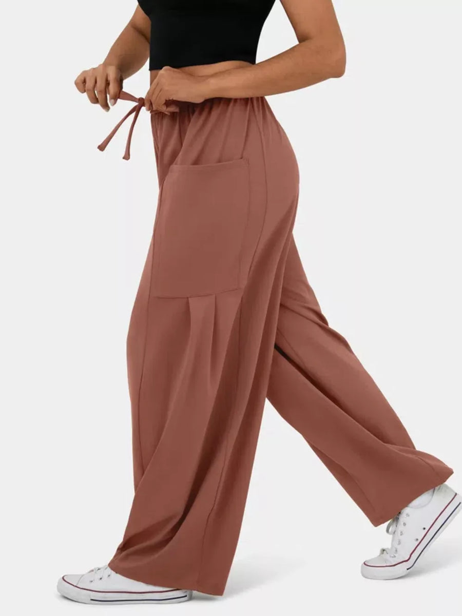 Rose Red maternity pants with wide legs, drawstring waist, and cargo pockets.