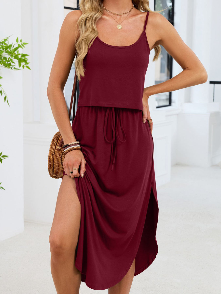 Burgundy scoop neck drawstring midi dress with side slits and spaghetti straps.