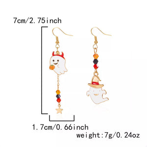 earrings in gold with novelty and dangle