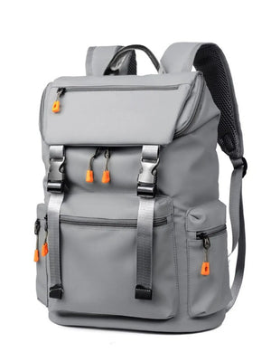 Gray tech-utility backpack with orange zip pulls and silver buckles.