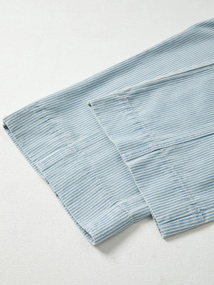 Light blue striped cotton blend drawstring jeans with a mid-rise cut.
