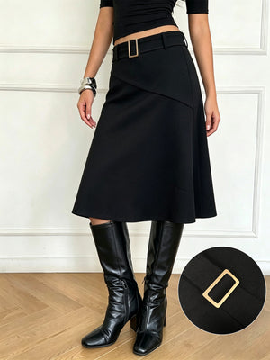 A-line skirt in black with belted and midi