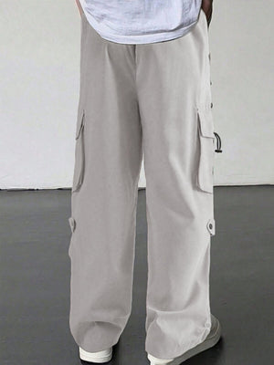 Light grey relaxed fit cargo pants with multiple pockets and drawstring cuffs.