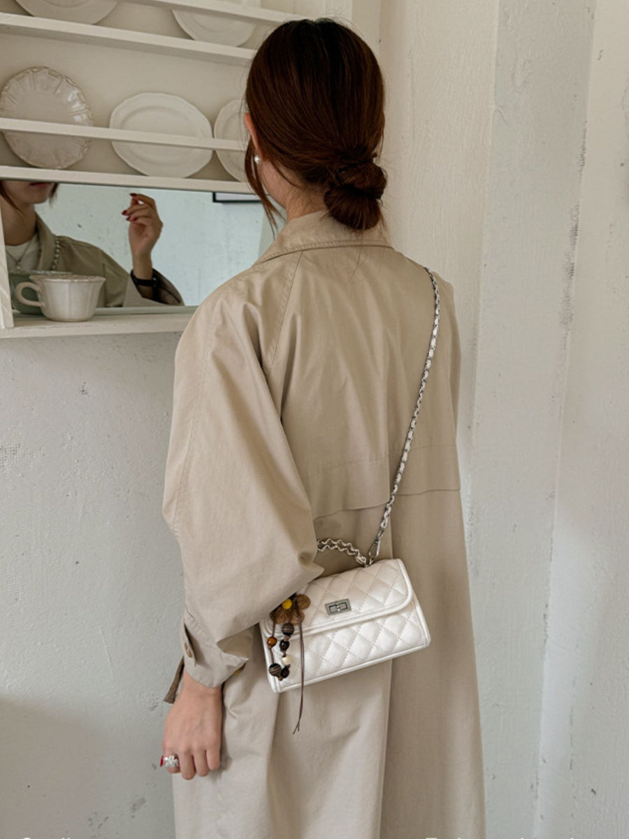 White crossbody bag with turn-lock and quilted