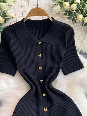 Black ribbed knit midi dress with collar and gold button detail
