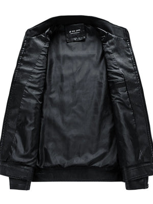 Black leather moto jacket interior with smooth lining and a pocket detail.