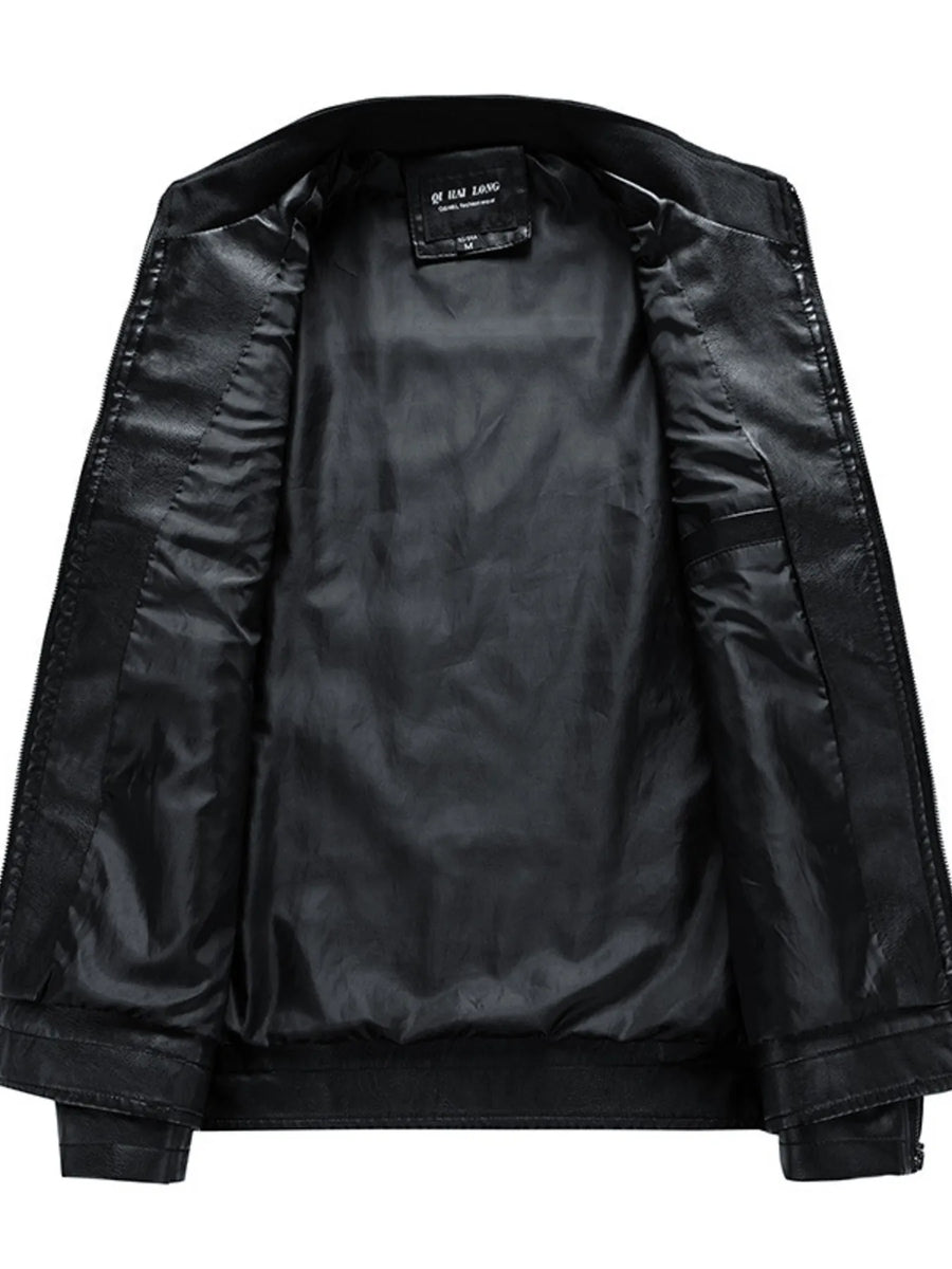Black leather moto jacket interior with smooth lining and a pocket detail.