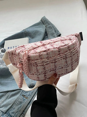 Pink textured tweed belt bag with braided pulls and white strap