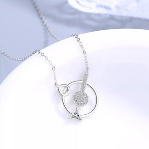 clear necklace featuring zircon embellishment and geometric