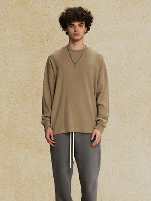 Oversized drop shoulder crewneck sweatshirt in khaki with crew neckline and long sleeves.