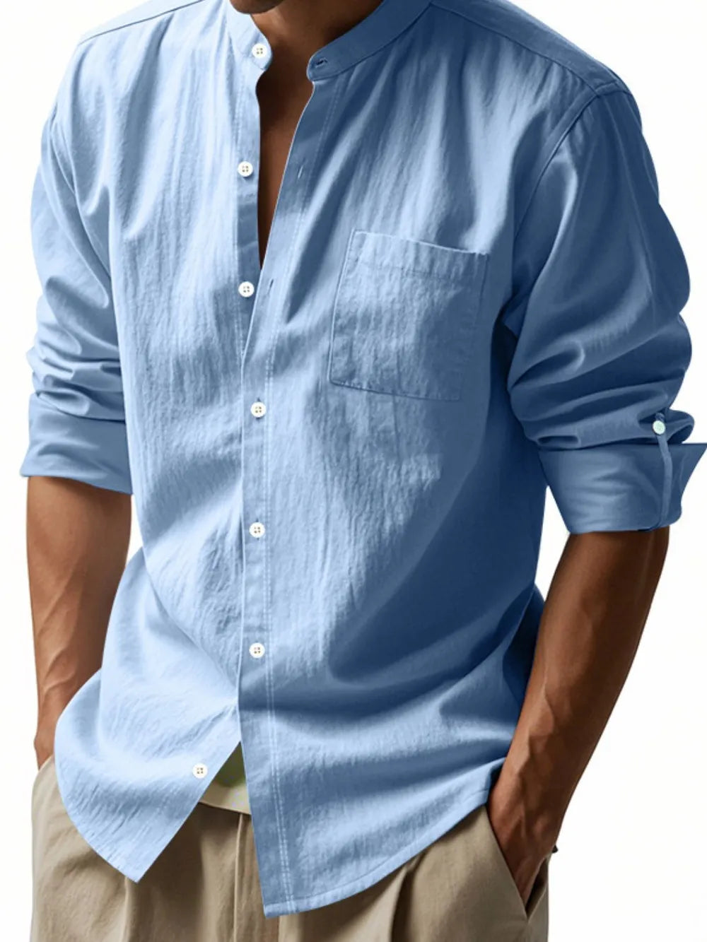 Light blue linen relaxed fit shirt with mandarin collar and chest pocket.