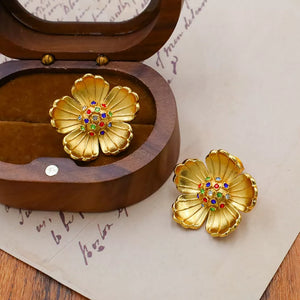 18K Gold-Plated,Titanium Steel,Zircon Care instructions: Avoid wearing during ex earrings in gold with floral silhouette