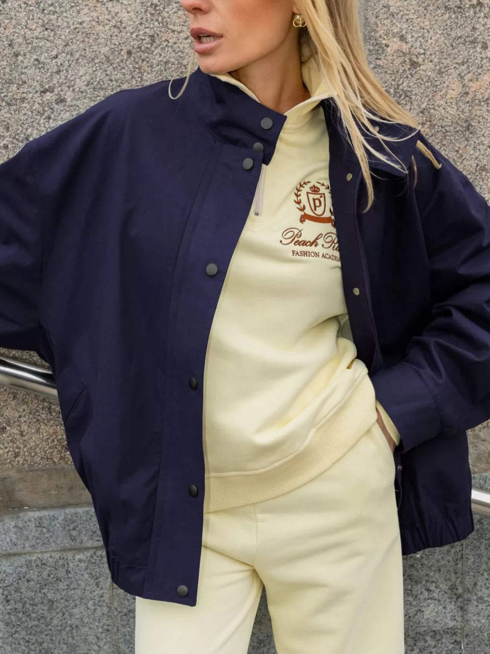 100% Cotton Care instructions: Machine wash cold bomber jacket in Navy with relaxed silhouette