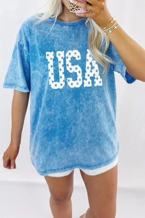 Blue acid wash cotton maternity t-shirt with white star USA graphic and crew neck.