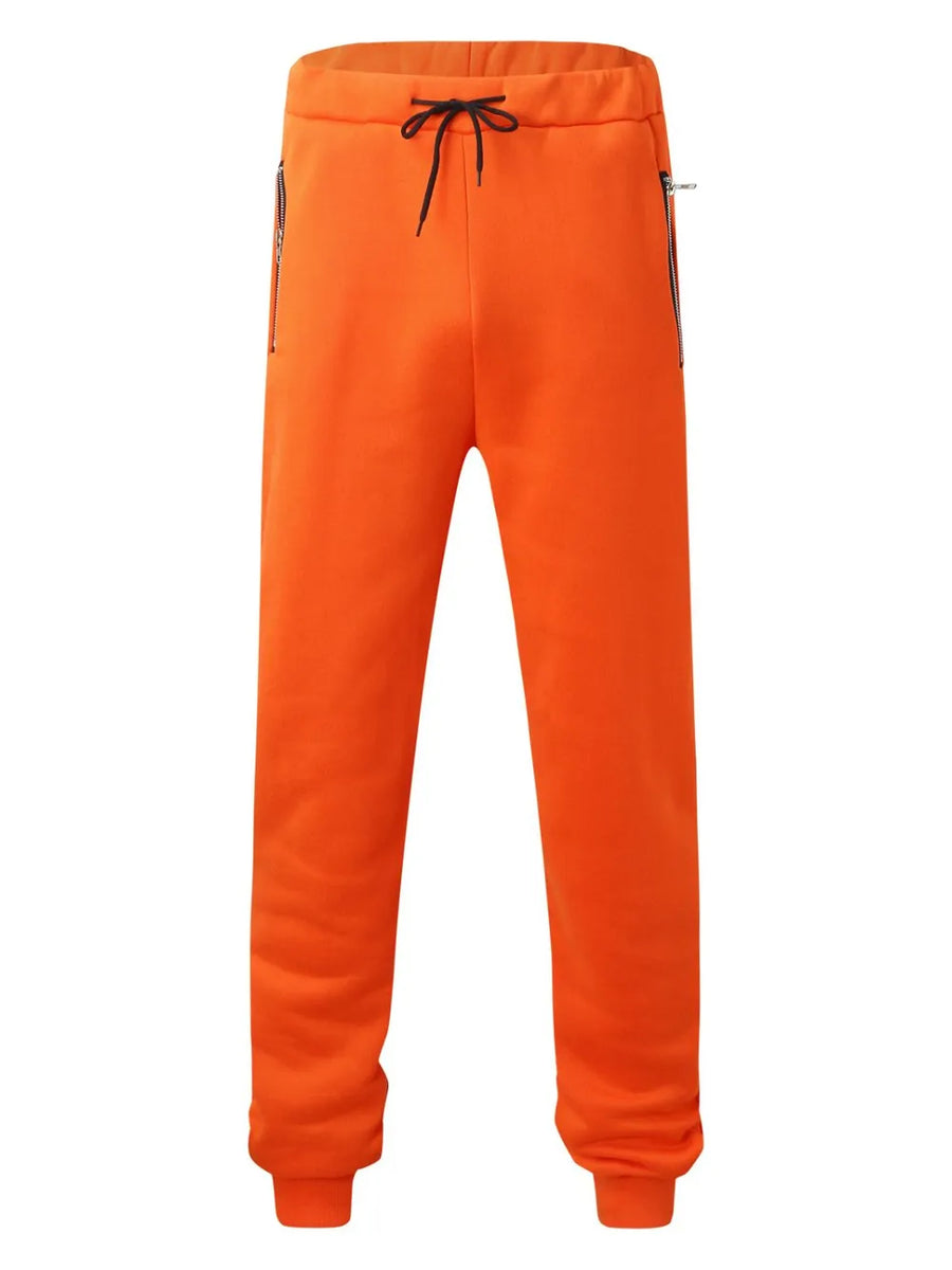 Orange fleece joggers with drawstring waist and zip pockets