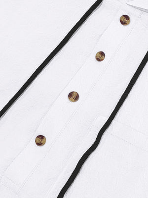 White textured shirt with black piping and brown buttons