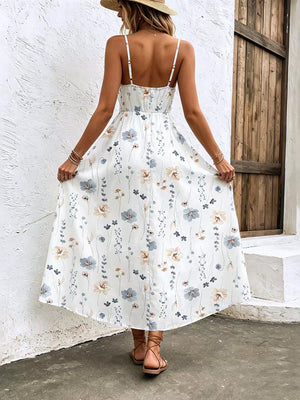 White floral print spaghetti strap midi dress with adjustable straps and a-line cut.
